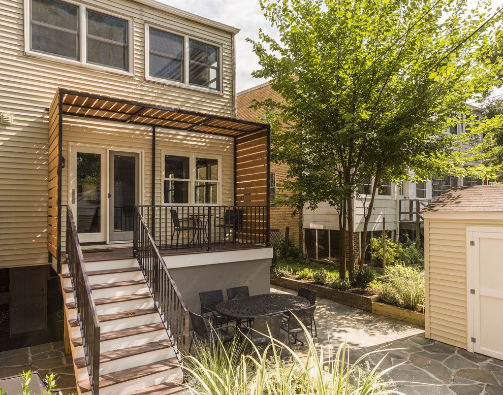 Example of a small transitional backyard deck design in DC Metro with a pergola