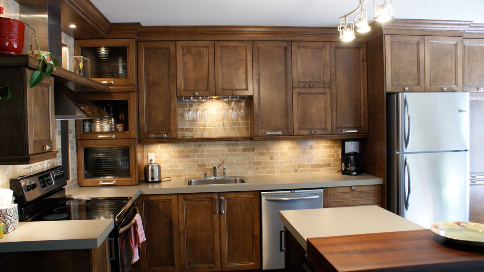 Inspiration for a small transitional eat-in kitchen remodel with a drop-in sink, shaker cabinets, brown cabinets, laminate countertops, multicolored backsplash, stone slab backsplash, stainless steel appliances and an island