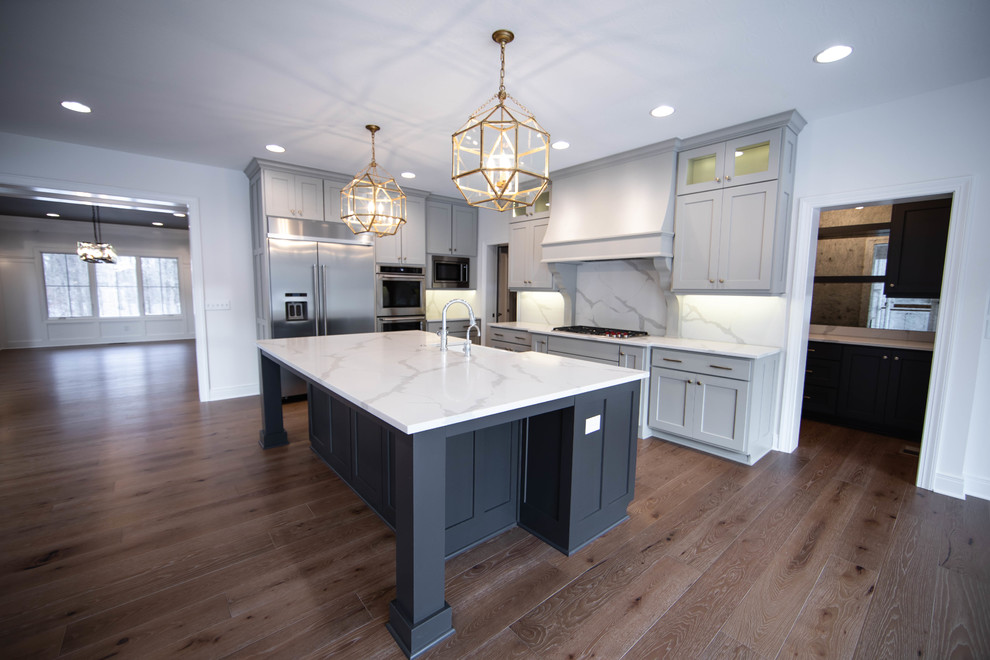 Design ideas for a modern kitchen in Indianapolis with a farmhouse sink, grey cabinets and with island.
