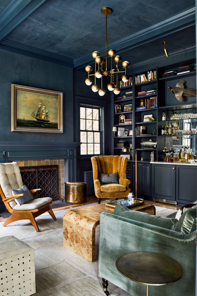 Idées déco pour un grand salon classique avec un mur bleu, une cheminée standard, un manteau de cheminée en carrelage et un plafond à caissons.