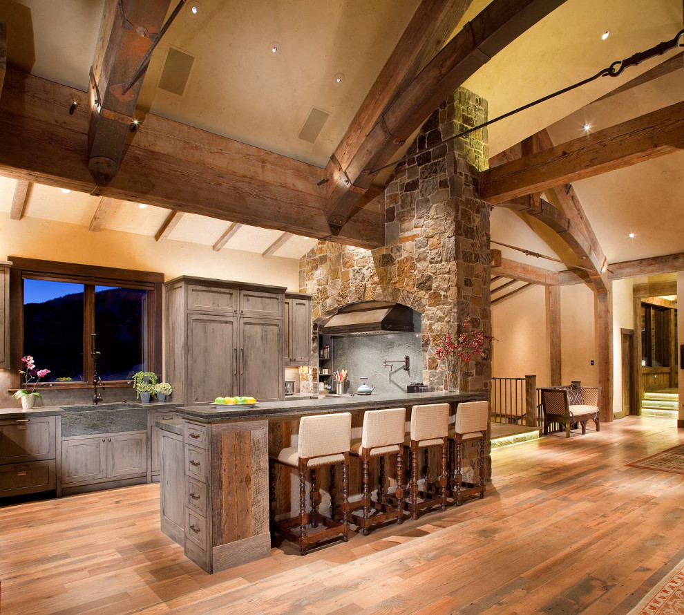 Example of a mountain style kitchen design in Denver