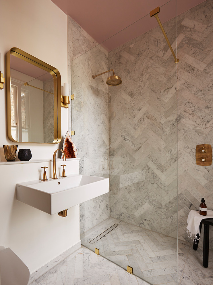 Inspiration for a mid-sized contemporary bathroom in London with marble, marble floors, a wall-mount sink, grey floor, a curbless shower, gray tile, white walls and an open shower.