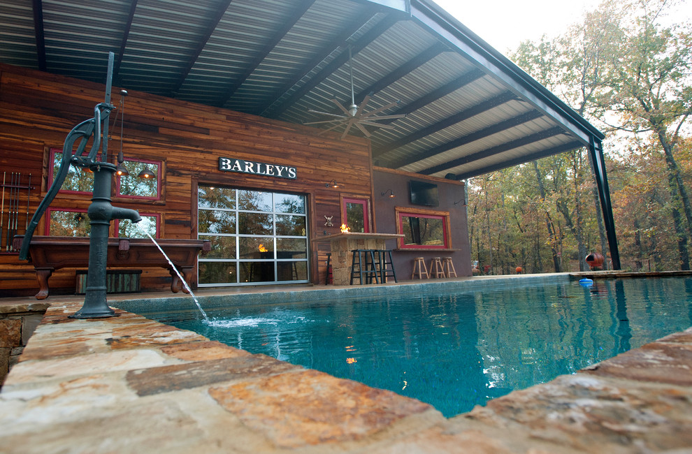 Inspiration for a rustic pool remodel in Dallas