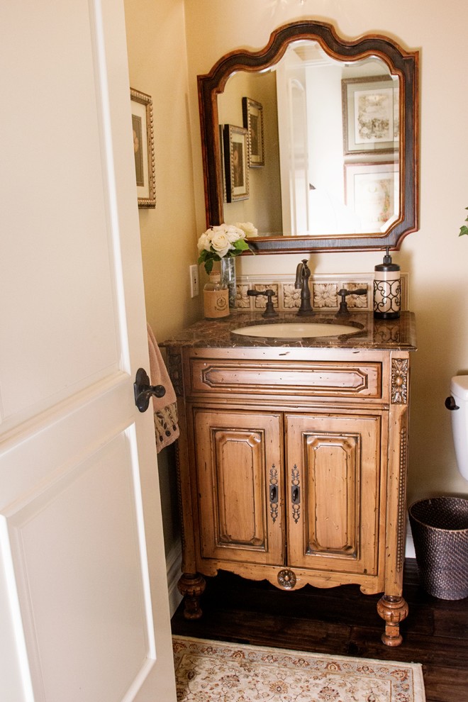 Inspiration for a transitional powder room in Orange County.