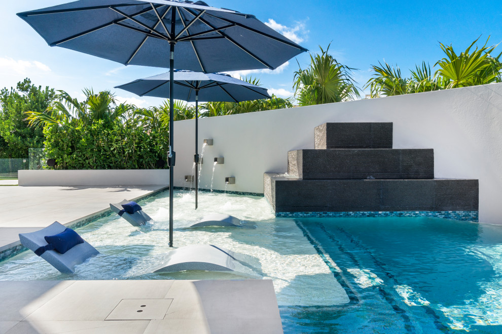 Transitional pool photo in Miami