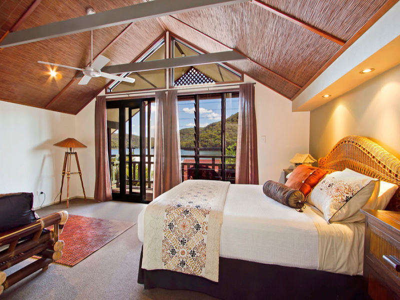 Tropical bedroom in Central Coast.