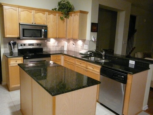Here is a link that might be useful: Uba Tuba Granite Countertops in Charlotte NC