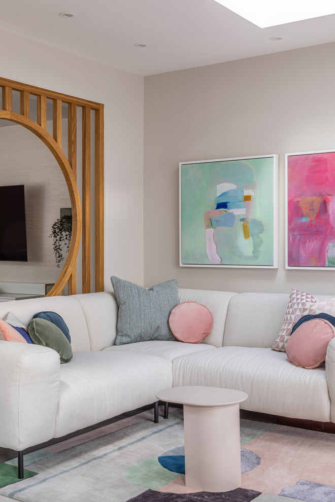 Inspiration for a contemporary living room in Cambridgeshire with grey walls and beige floors.