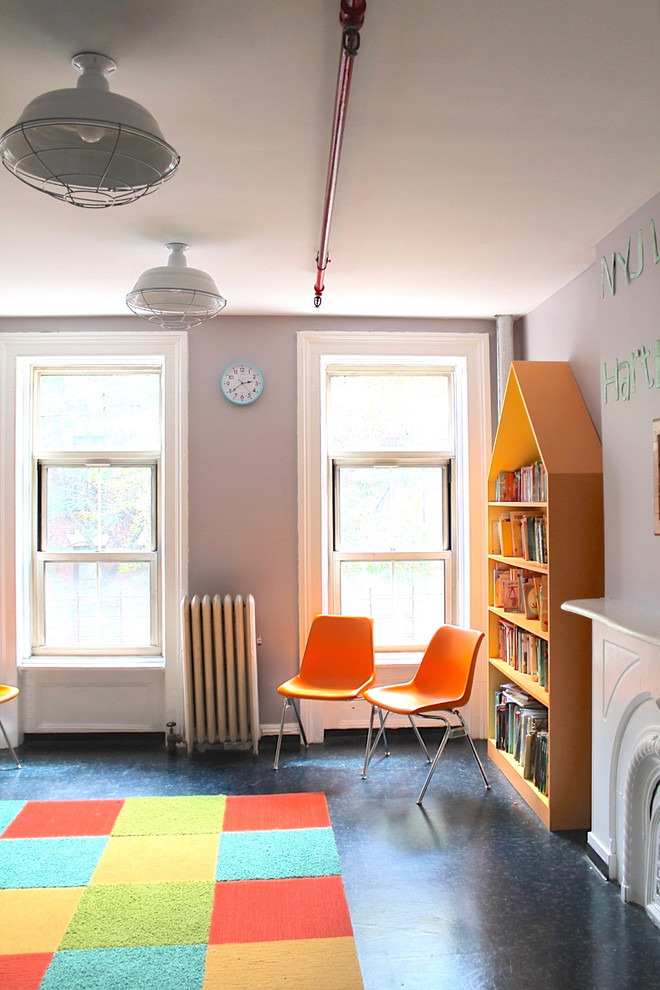This is an example of an industrial gender-neutral kids' room for kids 4-10 years old in New York with green walls.