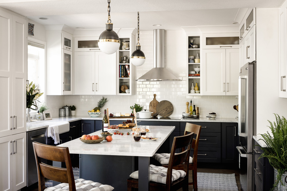 Example of a transitional kitchen design in Denver