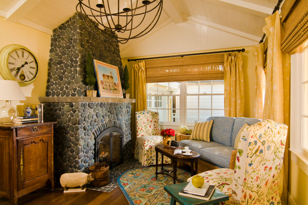 Inspiration for a traditional living room in San Francisco with a stone fireplace surround.