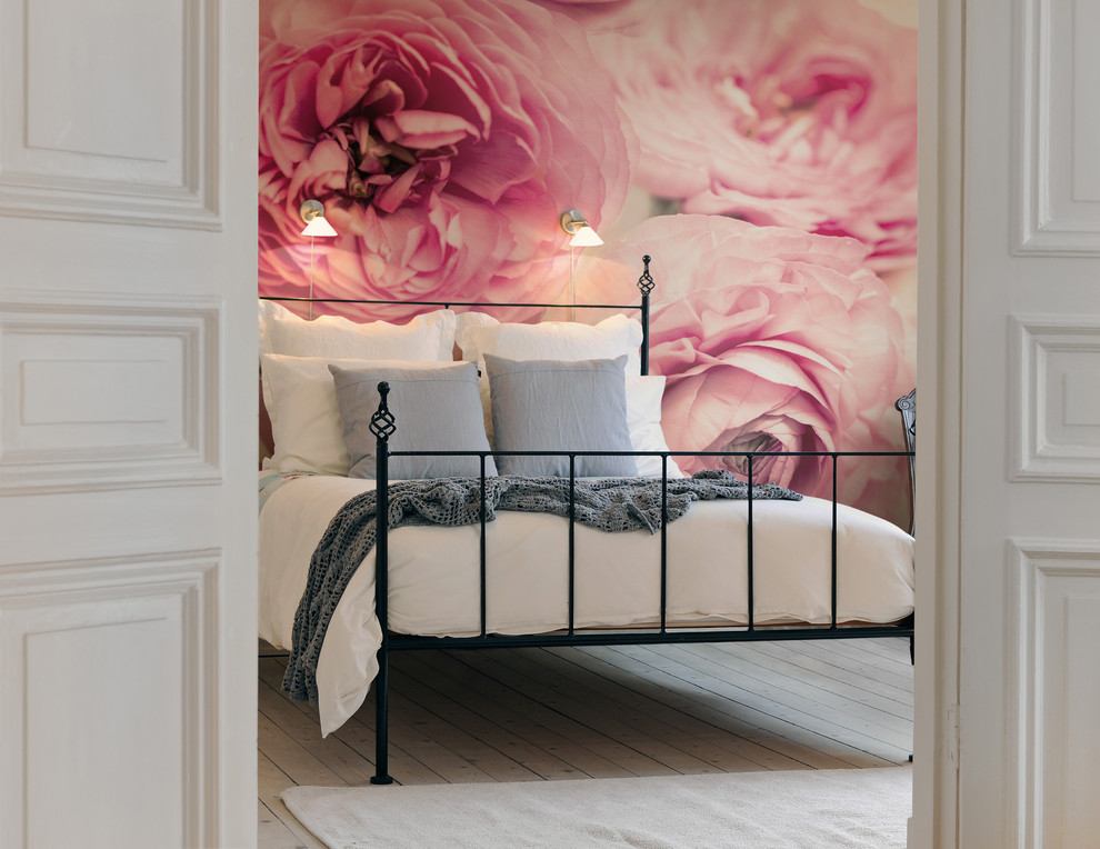 Design ideas for a transitional bedroom in Gothenburg with pink walls.