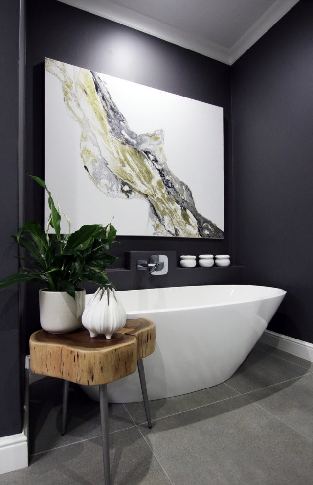 Mid-sized contemporary master bathroom in Other with light wood cabinets, a freestanding tub, an open shower, a one-piece toilet, gray tile, porcelain tile, grey walls, porcelain floors, a pedestal sink and wood benchtops.