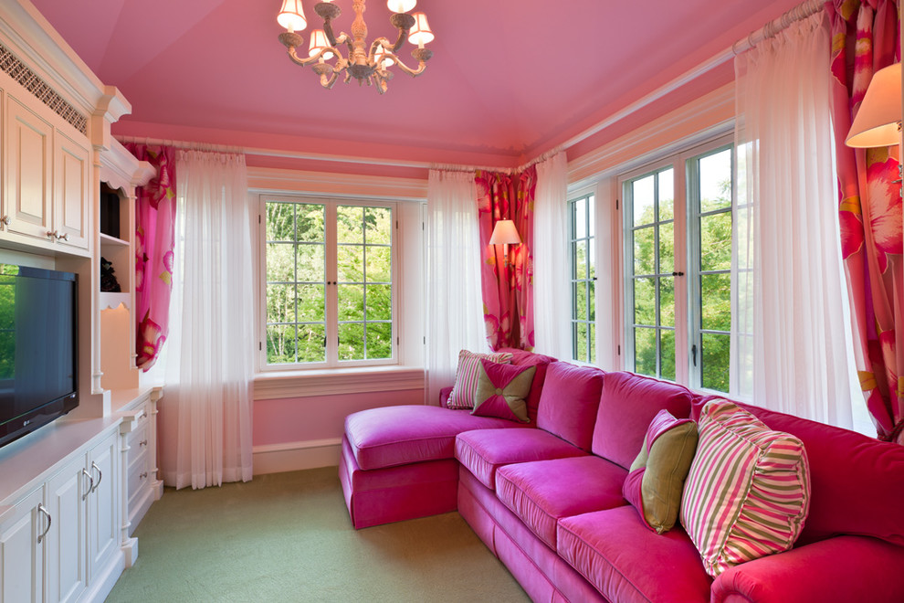 Large traditional living room in Philadelphia with pink walls, carpet and a wall-mounted tv.