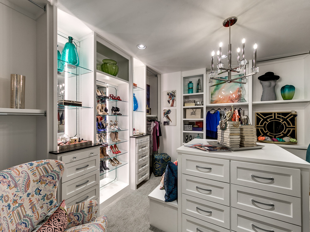 Photo of a transitional women's dressing room in Oklahoma City with white cabinets, carpet and recessed-panel cabinets.