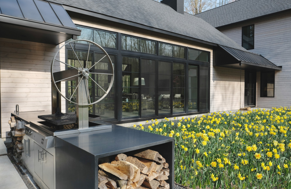 Farmhouse gray two-story wood exterior home idea in Chicago with a mixed material roof