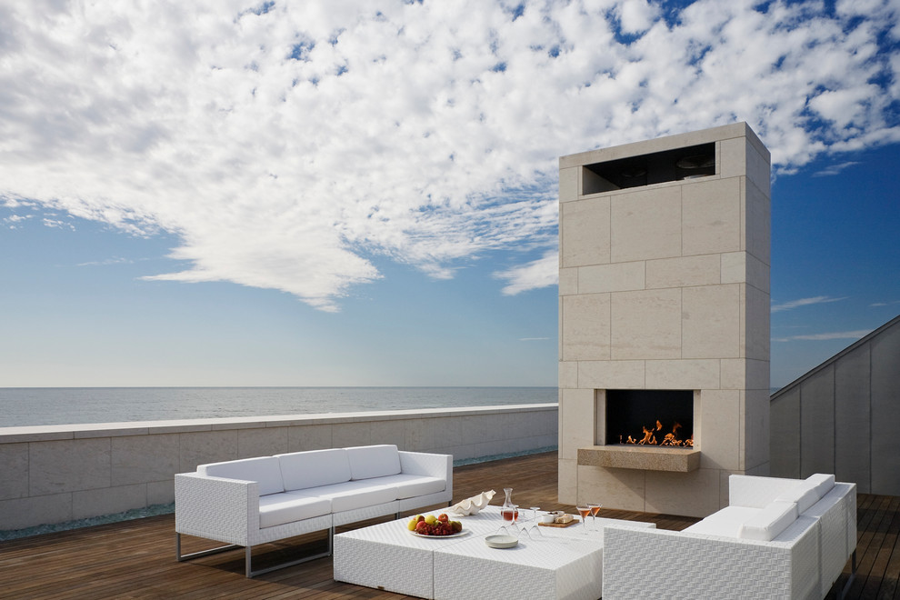 Contemporary rooftop and rooftop deck in New York with a fire feature and no cover.