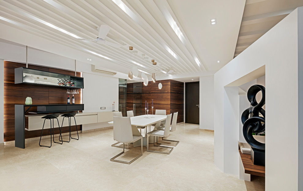 Design ideas for a modern dining room in Mumbai.