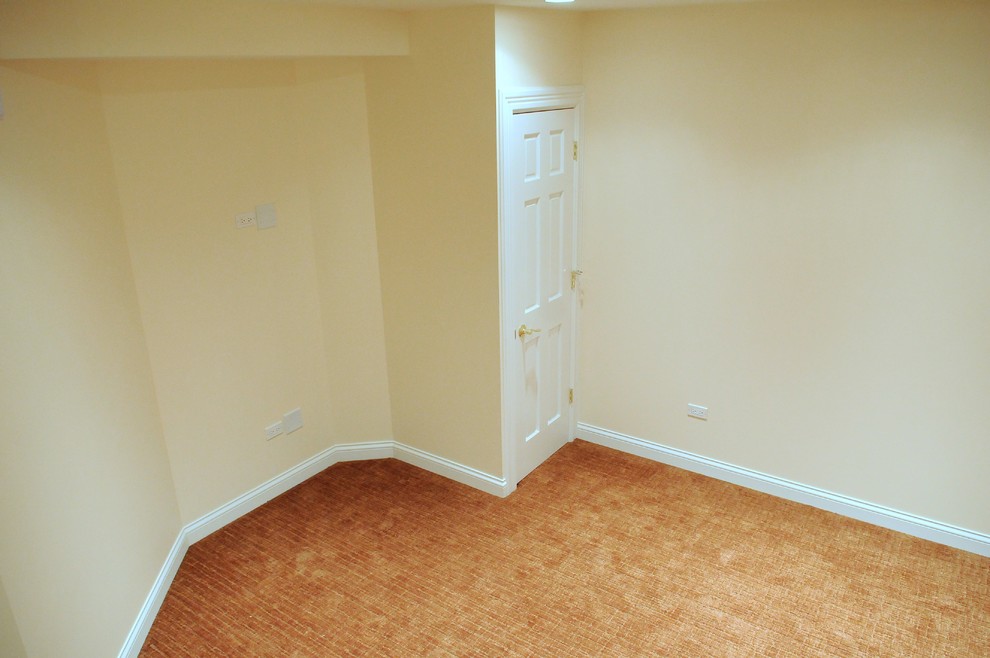Example of a transitional bedroom design in Chicago