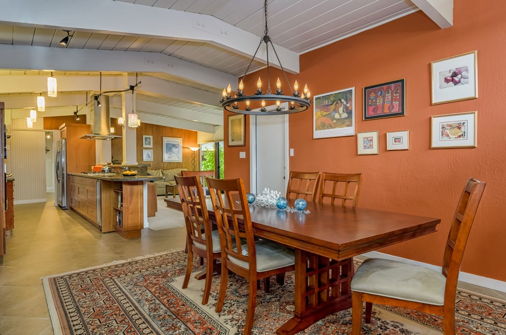 This is an example of a midcentury open plan dining in San Francisco with porcelain floors and brown floor.