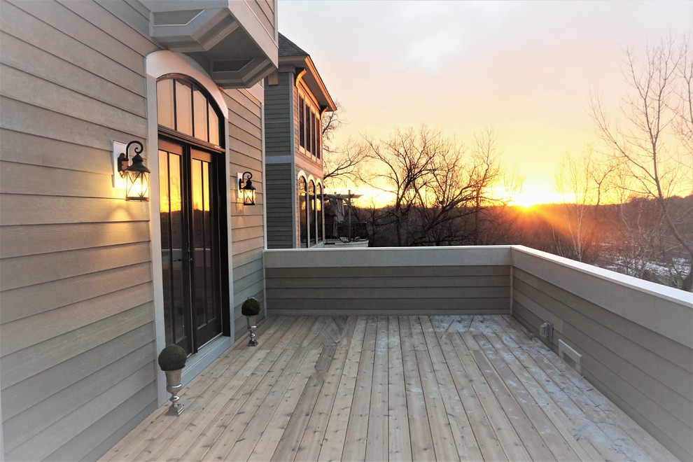 Deck - huge transitional backyard deck idea in Minneapolis with no cover