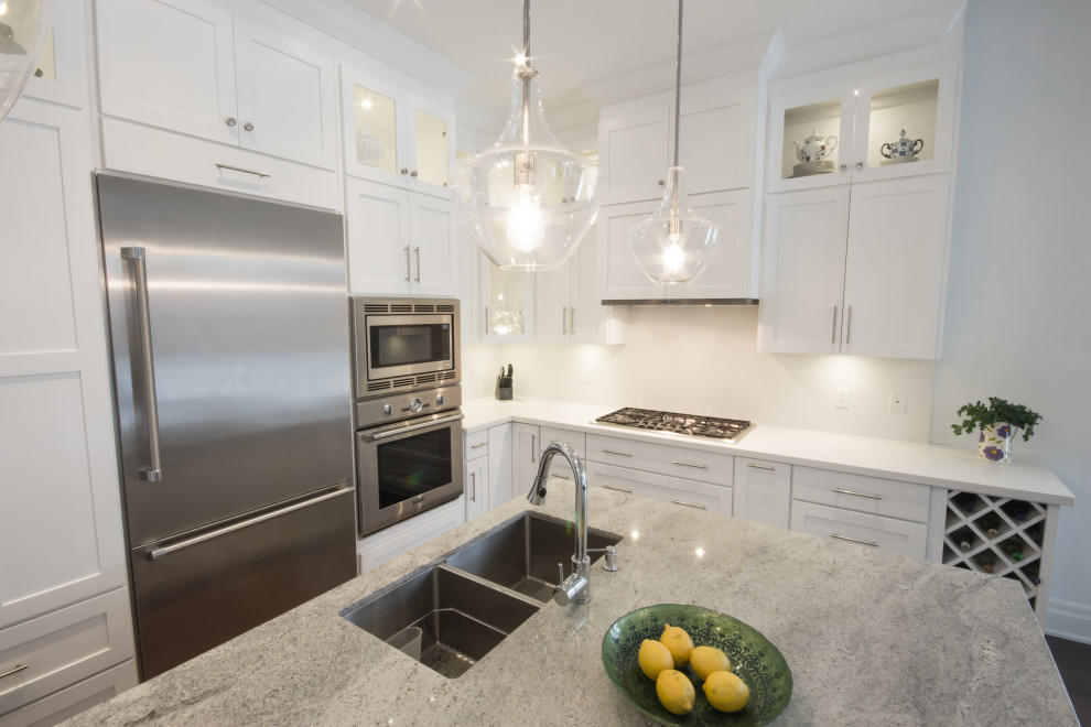 Example of a transitional kitchen design in Toronto