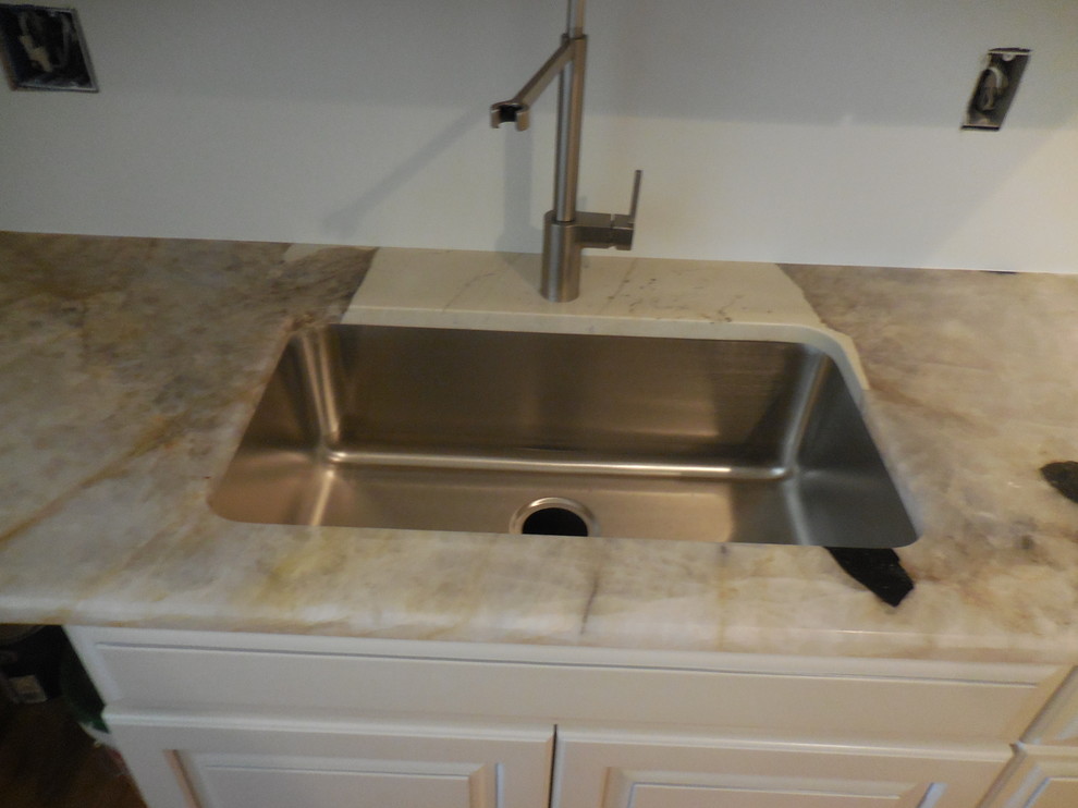 Mid-sized transitional kitchen photo in Baltimore with beige cabinets and quartzite countertops