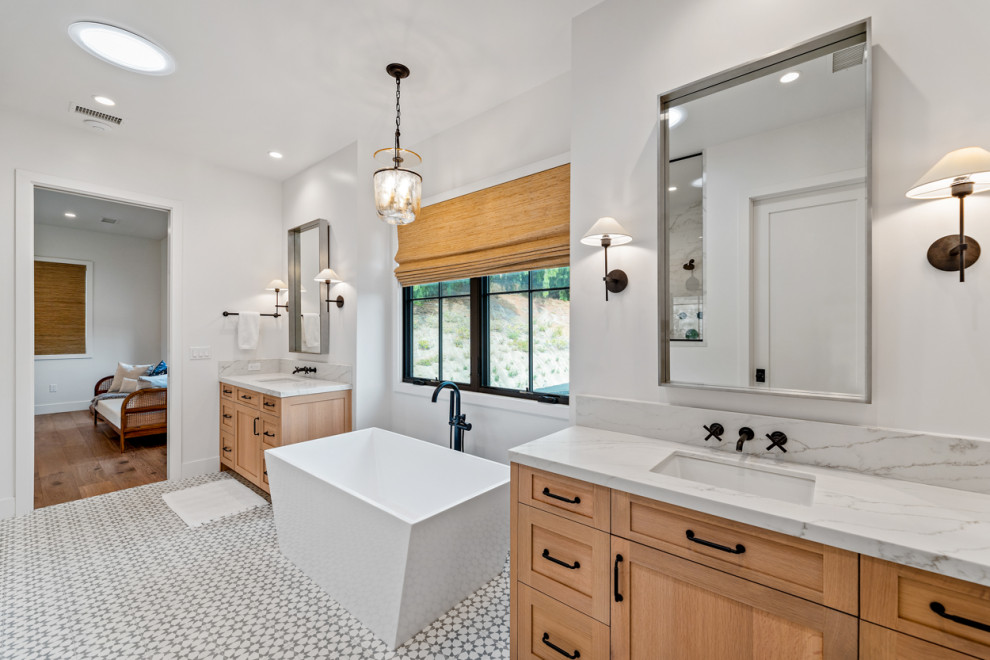Inspiration for an expansive country master bathroom in Los Angeles with shaker cabinets, light wood cabinets, a freestanding tub, a double shower, white tile, porcelain tile, white walls, cement tiles, an undermount sink, engineered quartz benchtops, an open shower, white benchtops, a double vanity and a built-in vanity.