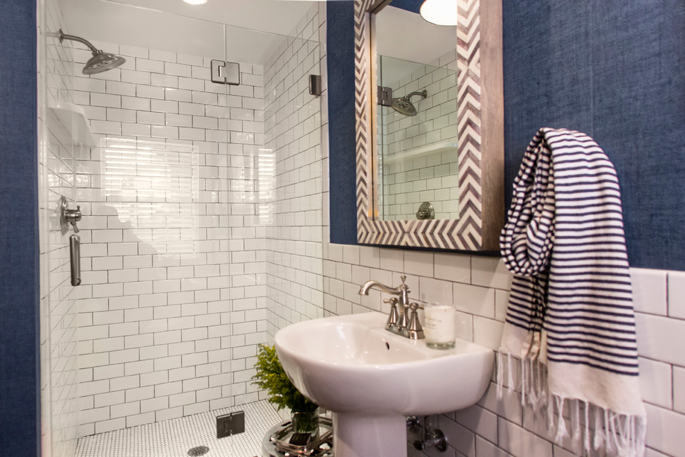 Mid-sized eclectic bathroom in Other with a one-piece toilet, white tile, ceramic tile, blue walls, ceramic floors and a pedestal sink.