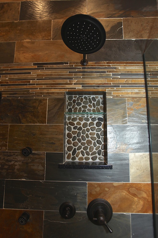 Home design - large rustic master slate tile brown floor home design idea in Indianapolis with brown cabinets, beige walls and an undermount sink