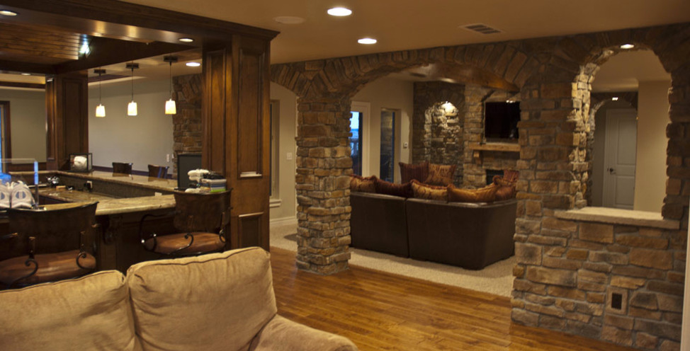 Example of a mountain style basement design in Denver