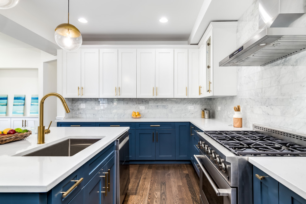 Photo of a medium sized traditional l-shaped kitchen/diner in New York with a submerged sink, shaker cabinets, engineered stone countertops, grey splashback, ceramic splashback, stainless steel appliances, dark hardwood flooring, an island, brown floors, white worktops and a drop ceiling.