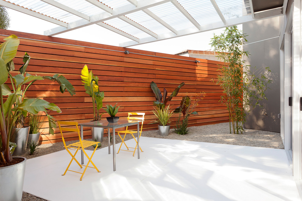 Inspiration for a modern patio in San Francisco with a pergola.