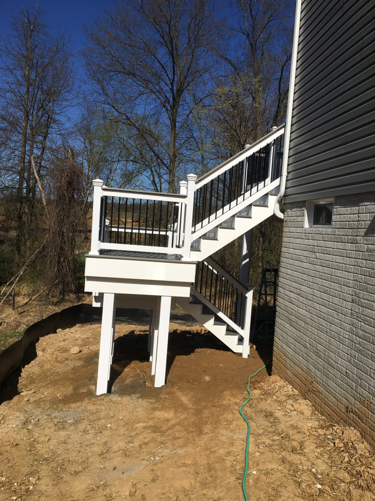 Mid-sized backyard second story deck photo in Baltimore with no cover