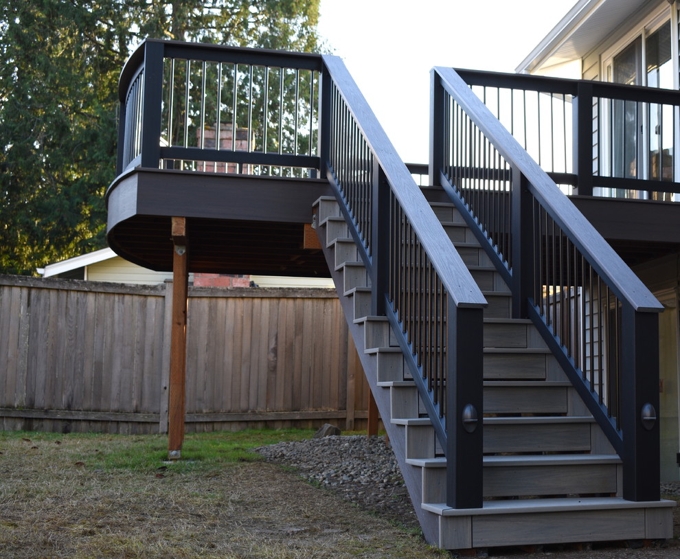 Inspiration for a mid-sized contemporary backyard deck in Seattle with no cover.