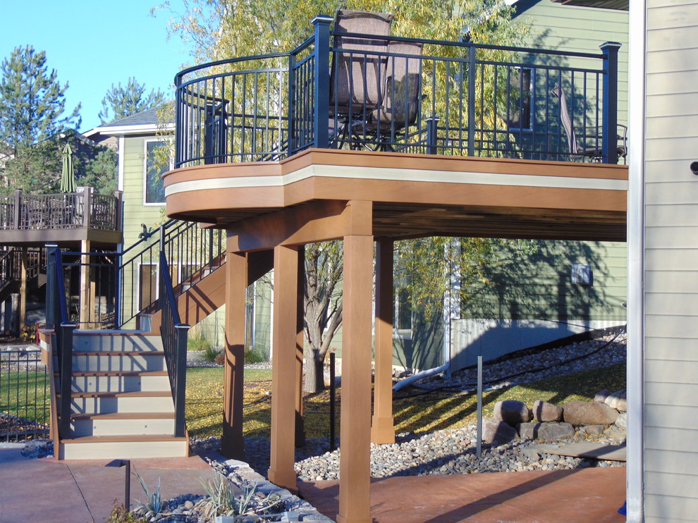 Design ideas for a mid-sized contemporary backyard deck in Minneapolis with no cover.