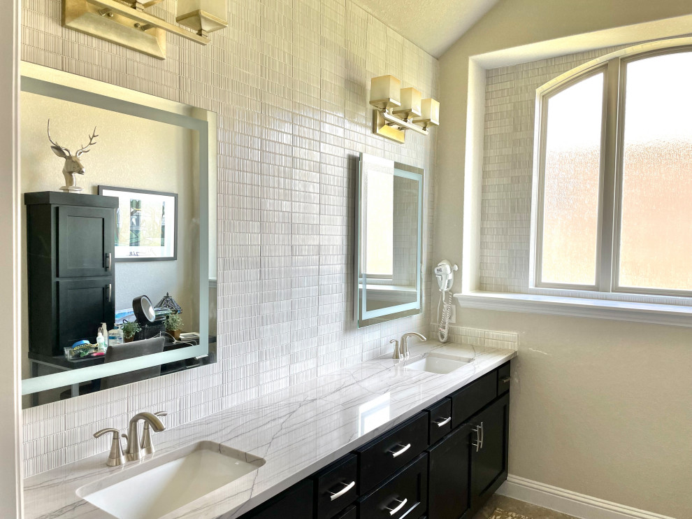 Inspiration for a mid-sized contemporary master multicolored tile and porcelain tile double-sink bathroom remodel in Austin with recessed-panel cabinets, black cabinets, an undermount sink, quartz countertops, multicolored countertops and a built-in vanity