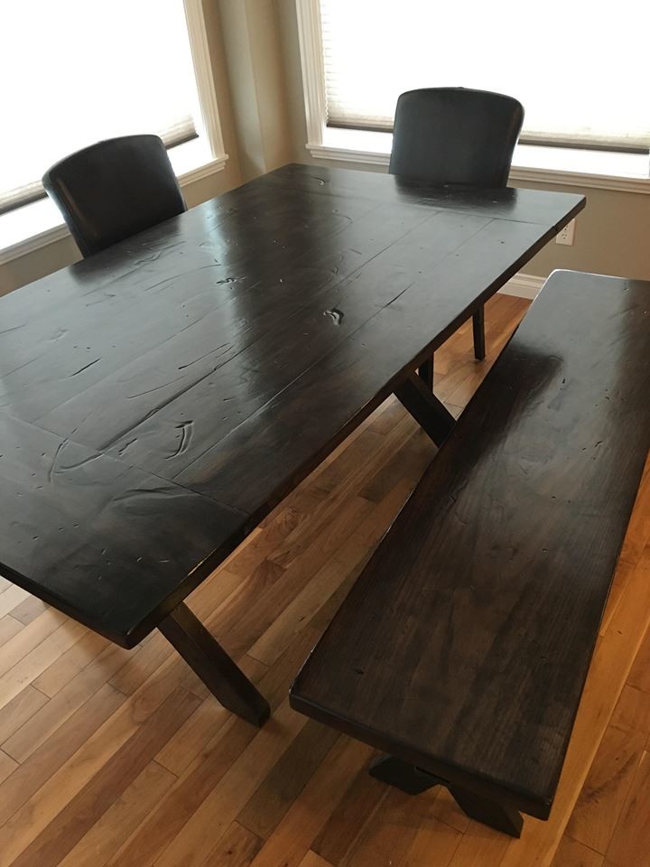 Mid-sized transitional medium tone wood floor dining room photo in Calgary with gray walls