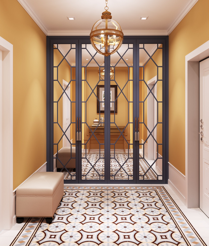 На фото: вестибюль среднего размера в стиле фьюжн с оранжевыми стенами, полом из керамической плитки, одностворчатой входной дверью, белой входной дверью и бежевым полом с