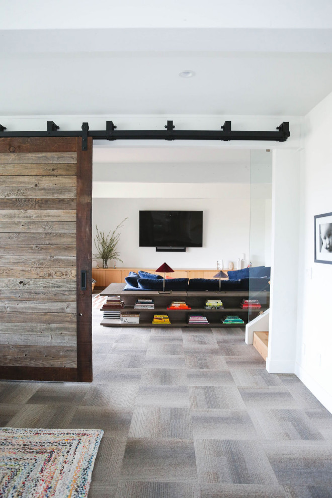 Inspiration for a large modern carpeted and gray floor basement remodel in Portland with white walls and no fireplace