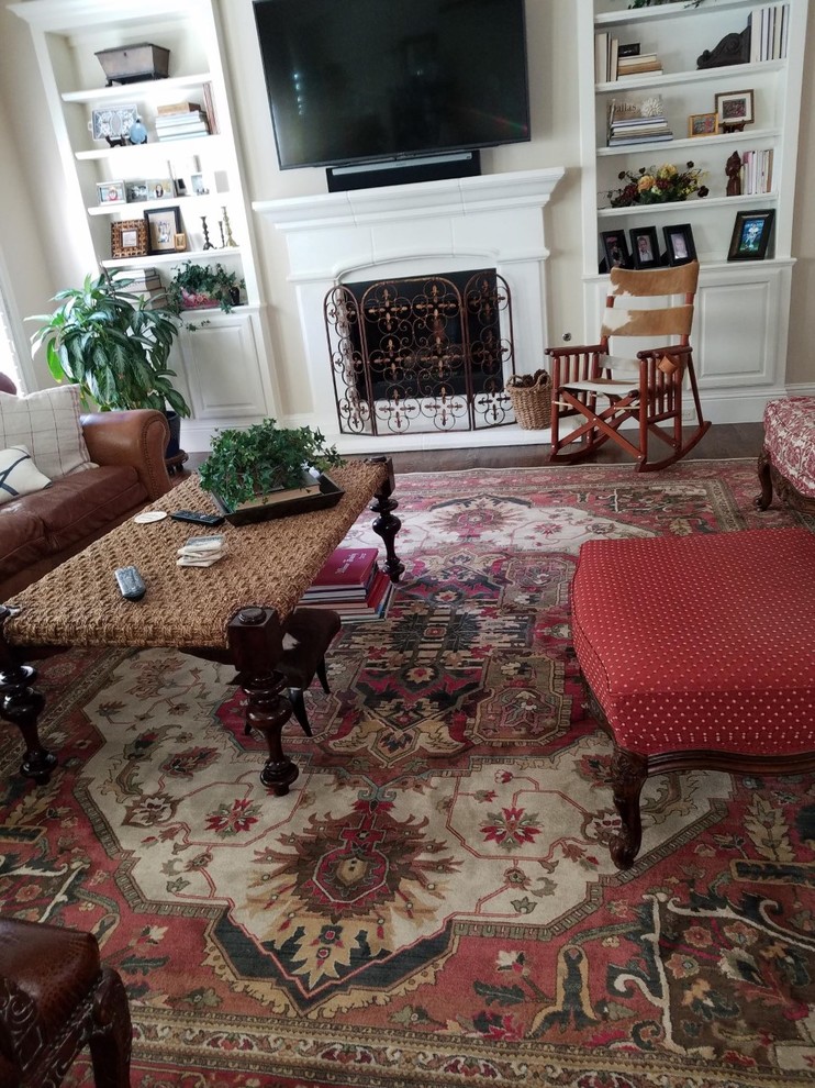 Does an oriental rug have to be centered on the fireplace in a room?