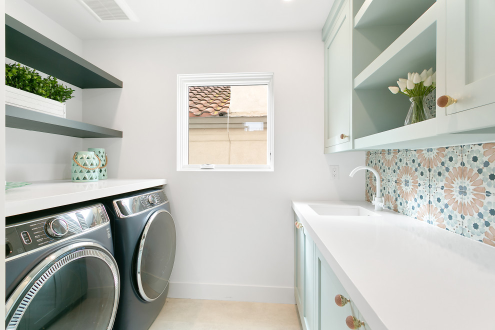 Design ideas for a beach style laundry room in Los Angeles.