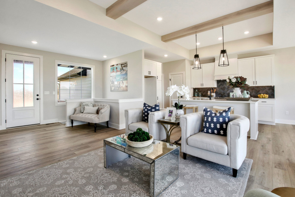 Inspiration for a large contemporary open concept light wood floor, brown floor and vaulted ceiling family room remodel in Wichita with gray walls, a ribbon fireplace, a tile fireplace and a wall-mounted tv