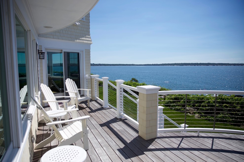 Photo of a beach style deck in Providence.