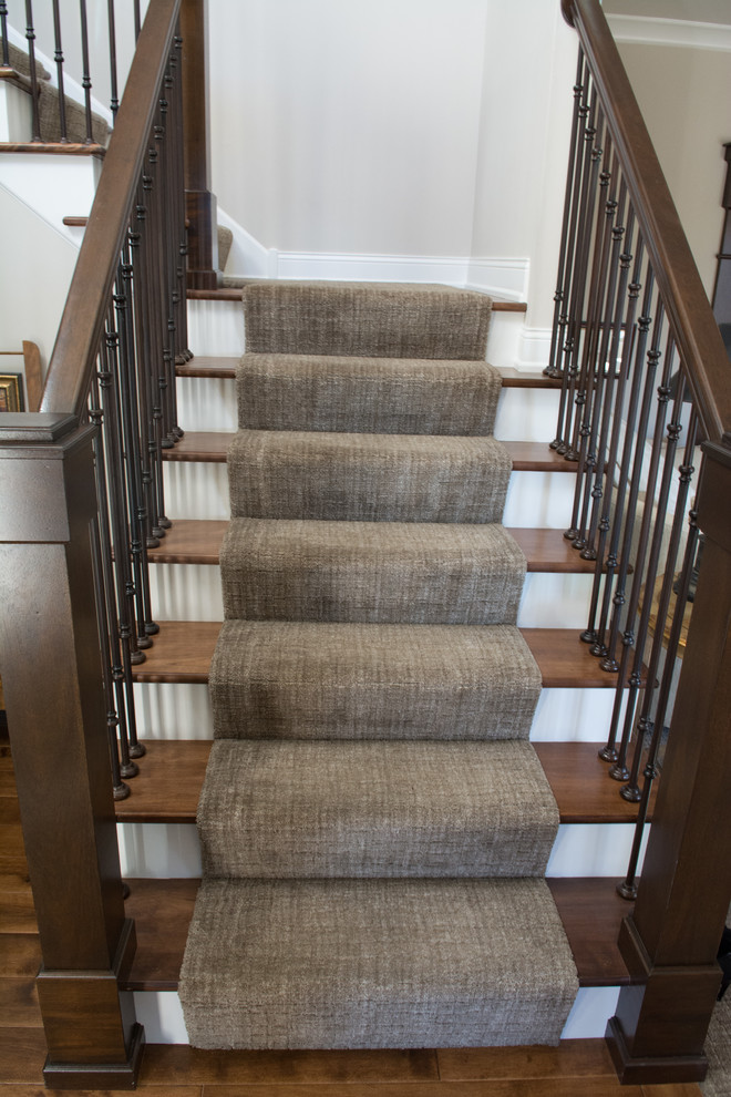 Staircase - mid-sized transitional wooden l-shaped mixed material railing staircase idea in Minneapolis with painted risers