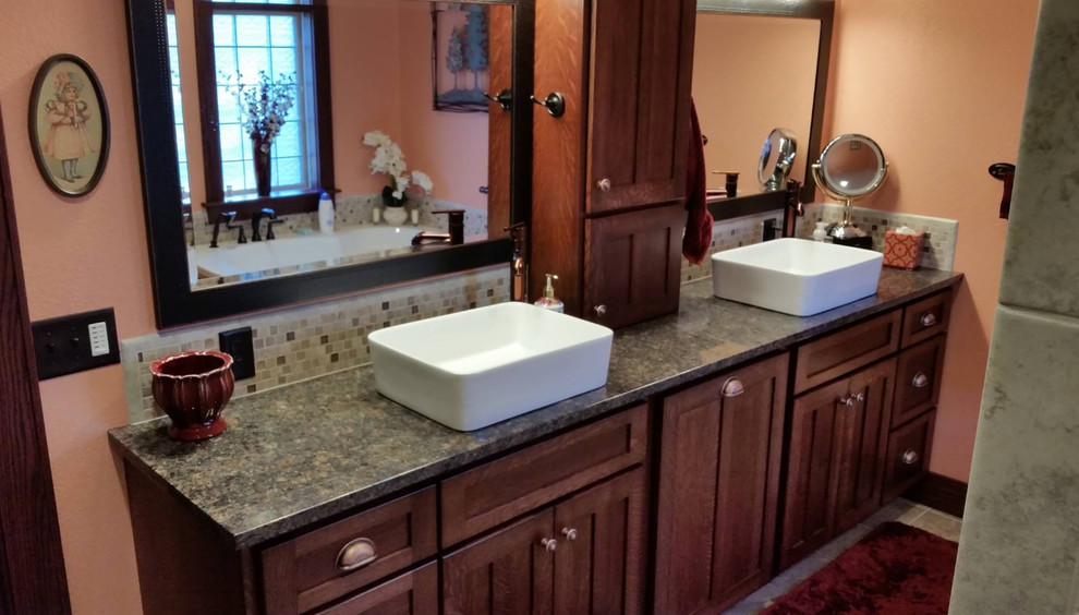 Design ideas for a modern bathroom in Wichita with recessed-panel cabinets, dark wood cabinets, mosaic tile, orange walls, granite benchtops, brown floor and grey benchtops.