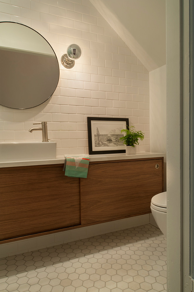 Photo of a mid-sized contemporary 3/4 bathroom in San Francisco with white walls and ceramic floors.