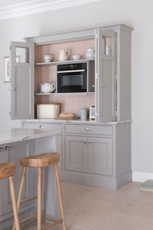 Inspiration for a large traditional kitchen in Hampshire with an integrated sink, shaker cabinets, grey cabinets, marble benchtops, porcelain splashback, coloured appliances, with island and white benchtop.