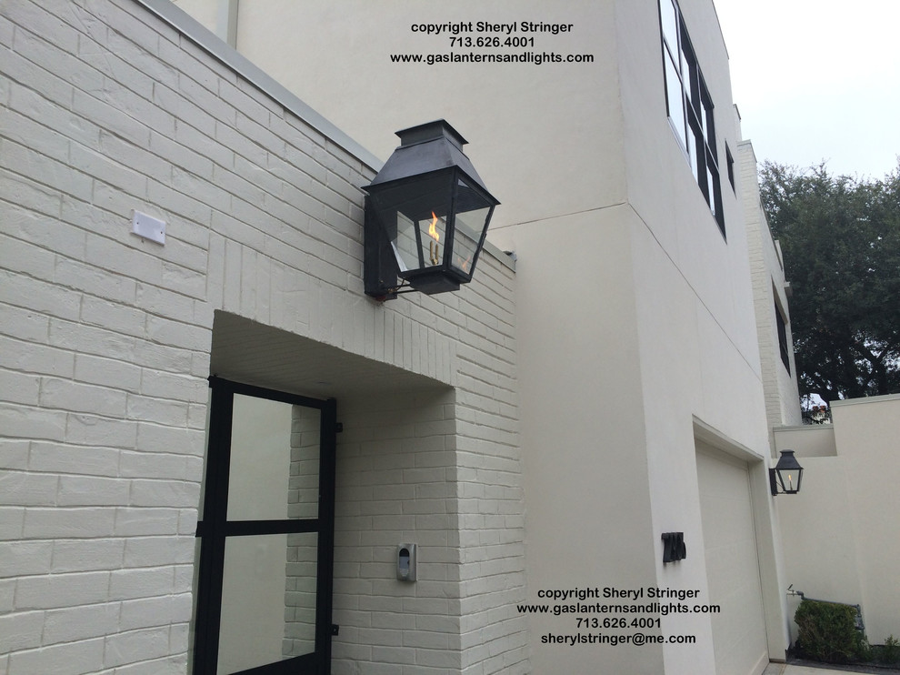 Sheryl's Extra Large V Style Gas Lanterns on Contemporary Townhouse