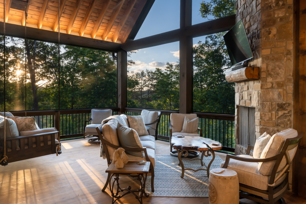 Mid-sized transitional wood railing deck photo